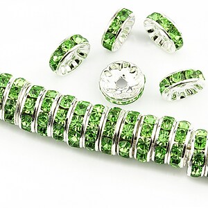 Distantiere argintii cu rhinestones verzi 10mm (rondele 3,5x10mm)