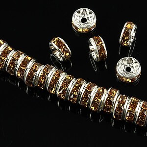 Distantiere argintii cu rhinestones maro 8mm (rondele 3,5x8mm)