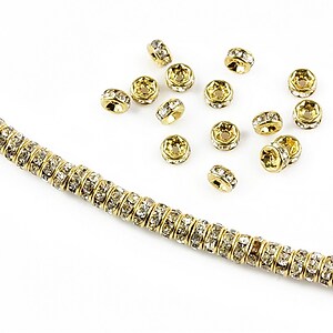 Distantiere aurii cu rhinestones albe 4mm (rondele 2x4mm)