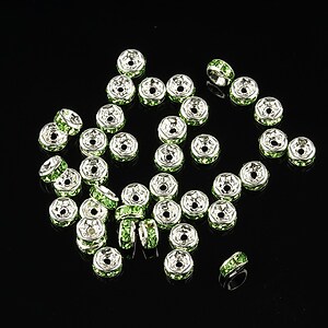 Distantiere argintii cu rhinestones verzi 4mm (rondele 2x4mm)