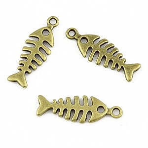 Charm bronz os de peste 25x9mm