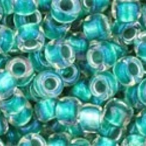 Margele Toho rotunde 8/0 - Inside-Color Rainbow Crystal/Teal Lined