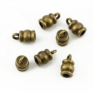 Capat de snur bronz 11x6mm (interior 4mm)