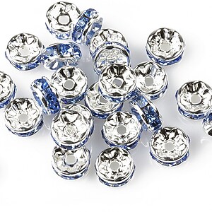 Distantiere cu rhinestone albastre 4x8mm