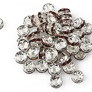 Distantiere cu rhinestone maro 2,5x6mm