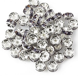 Distantiere cu rhinestone mov 2,5x6mm