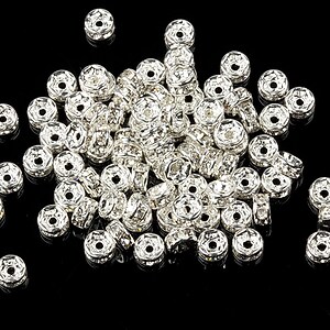 Distantiere argintii cu rhinestone albe 2x4mm