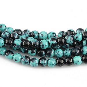 Ocean jade sfere 4mm (10 buc.) - turcoaz - negru