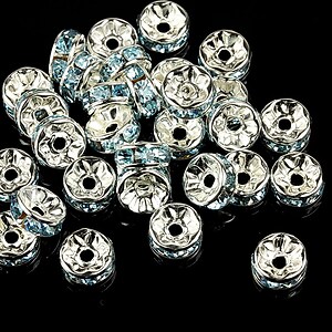 Distantiere cu rhinestone bleu 4x8mm