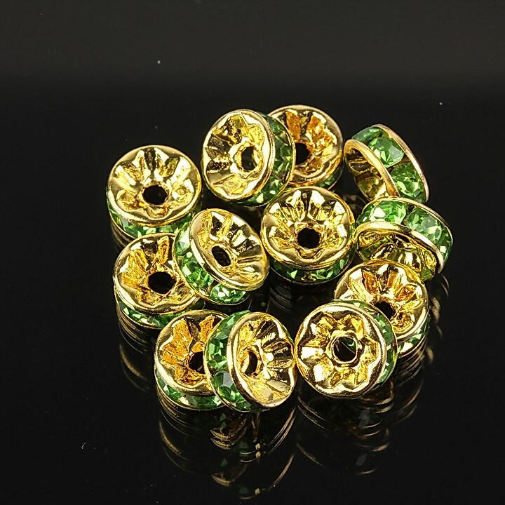 Distantiere aurii cu rhinestones verzi 8mm (rondele 3,5x8mm)