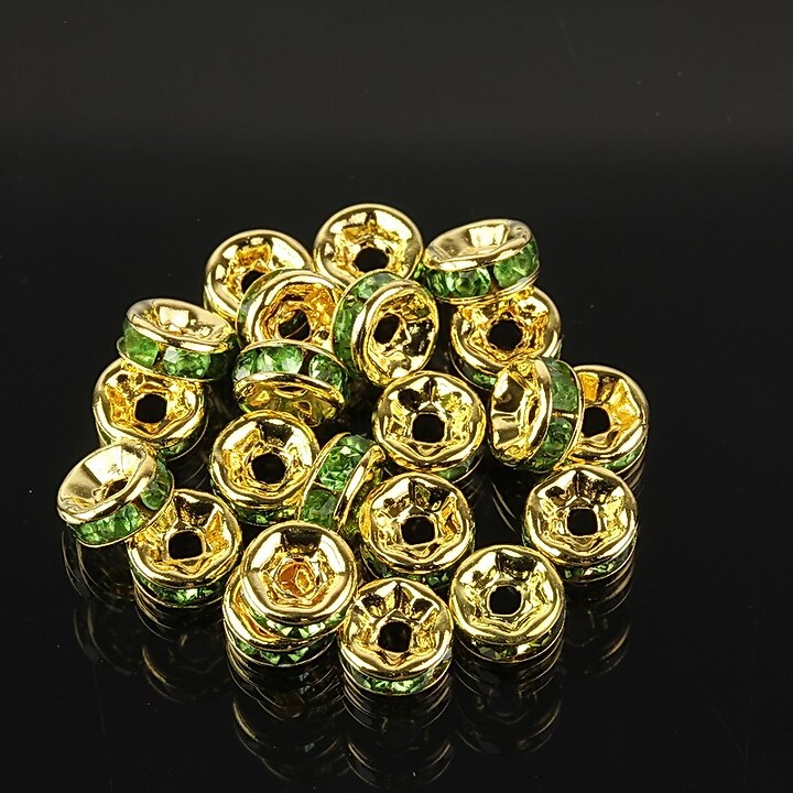 Distantiere aurii cu rhinestones verzi 6mm (rondele 3x6mm)