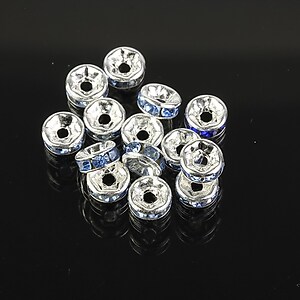 Distantiere argintii cu rhinestones albastre 6mm (3x6mm)